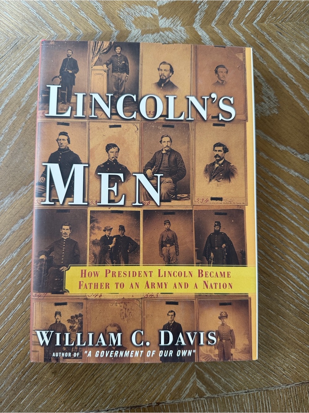 free press Lincoln's Men Book Cover Brown & Yellow Band